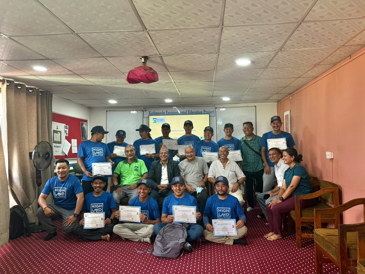 Highland Expeditions guides holding certificates after completing wilderness first aid training